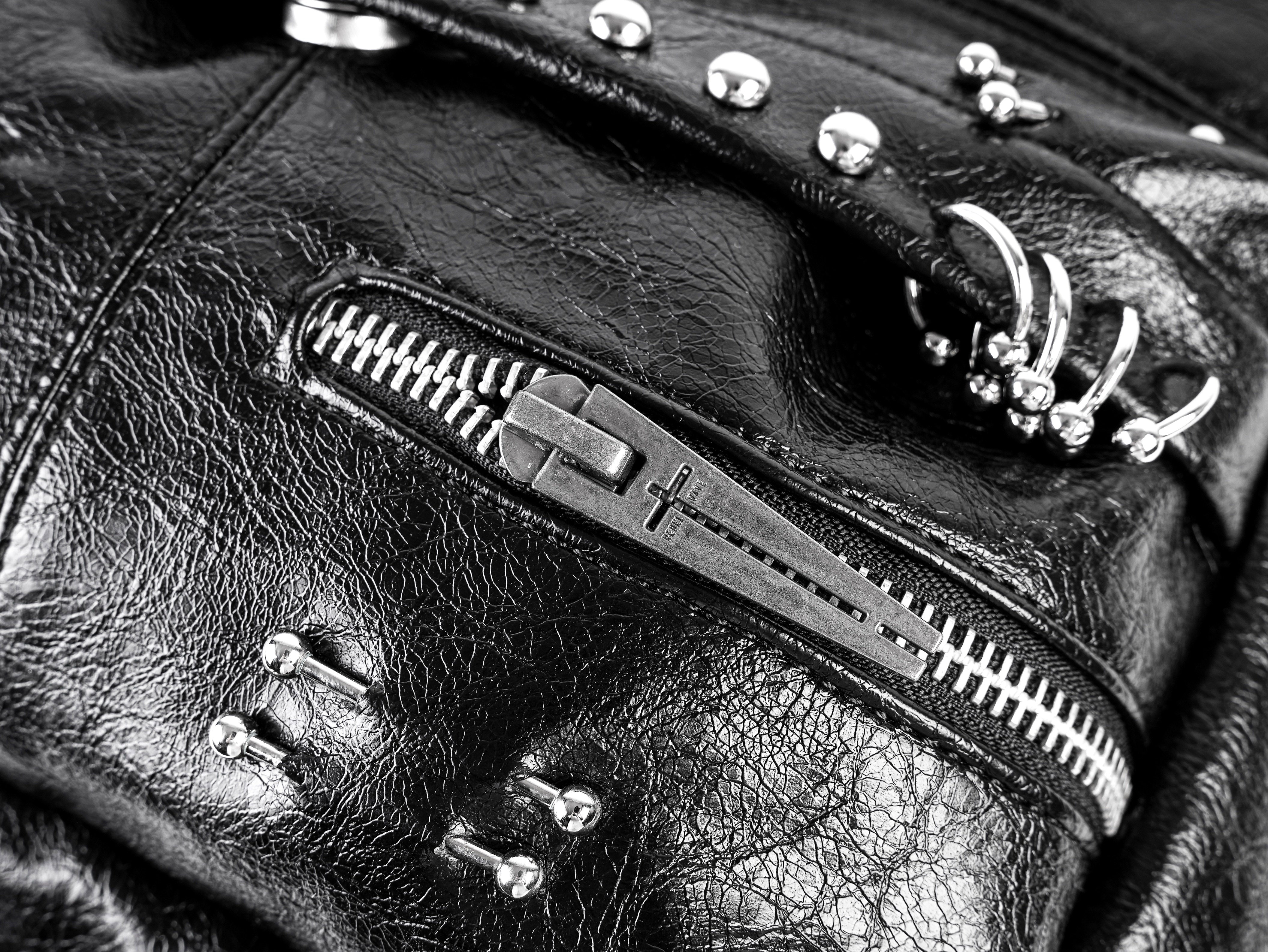 "✝" Cross-cracked leather backpack