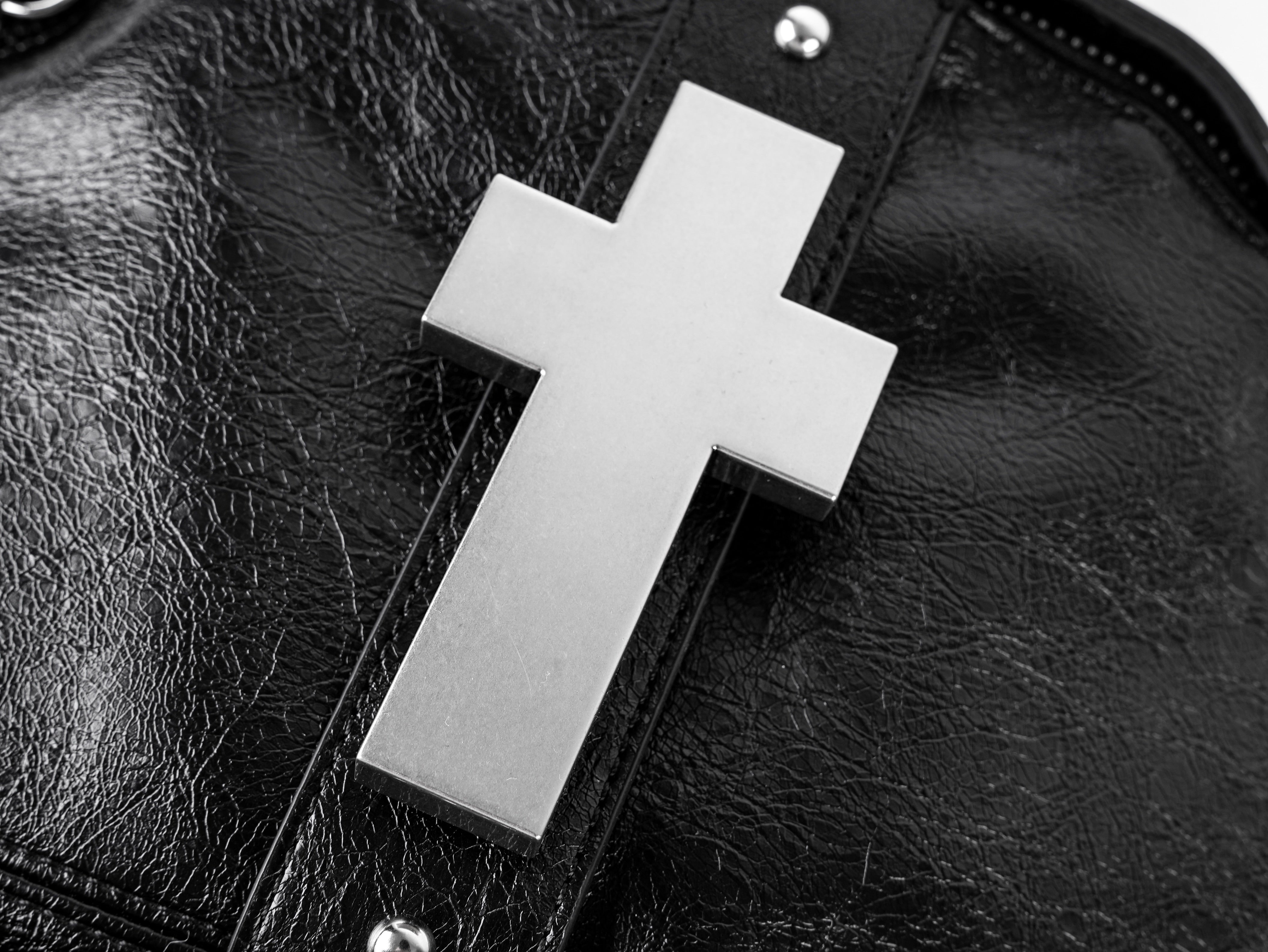 "✝" Cross-cracked leather backpack