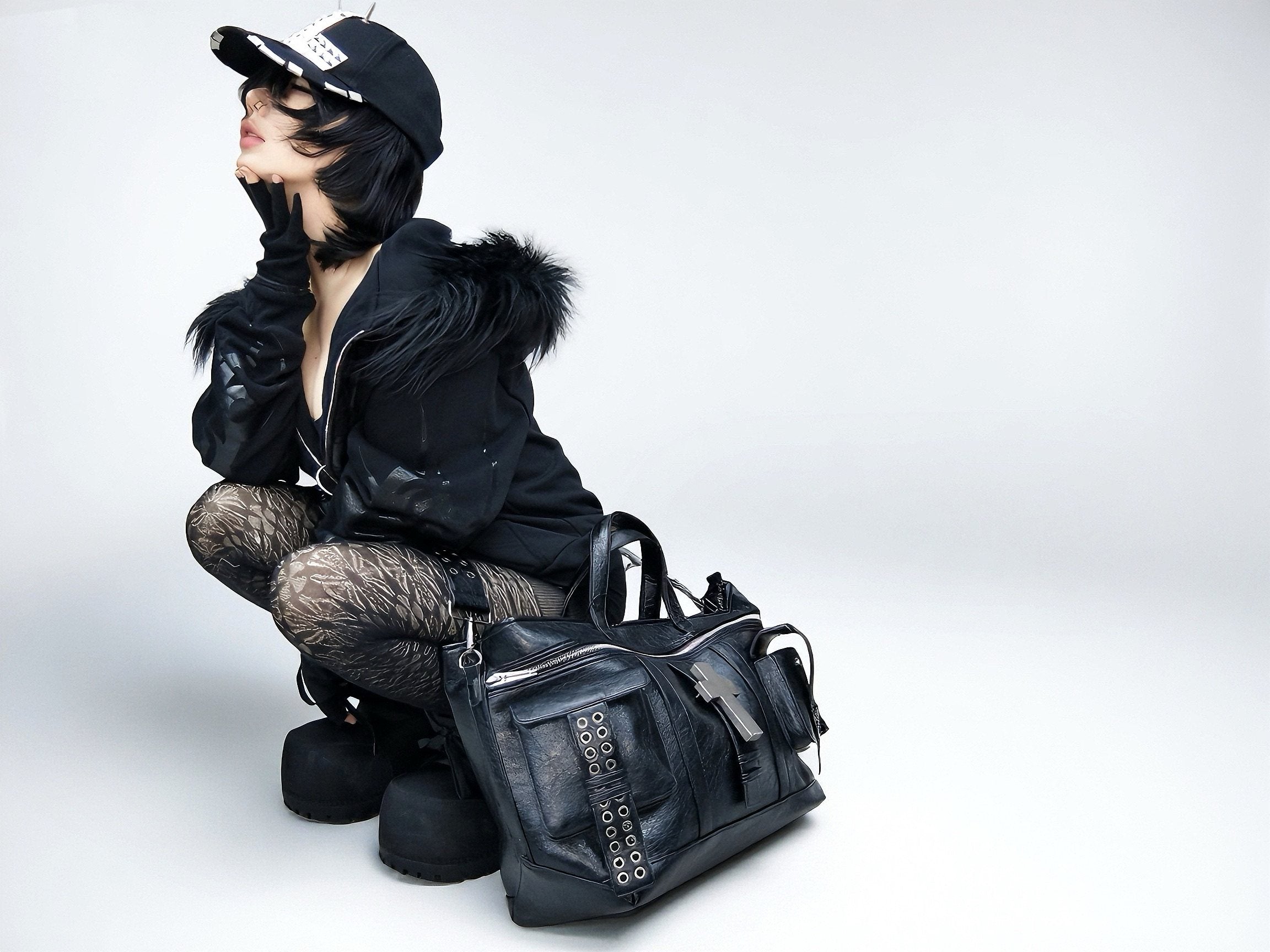 "✝" Cross-cracked leather bag