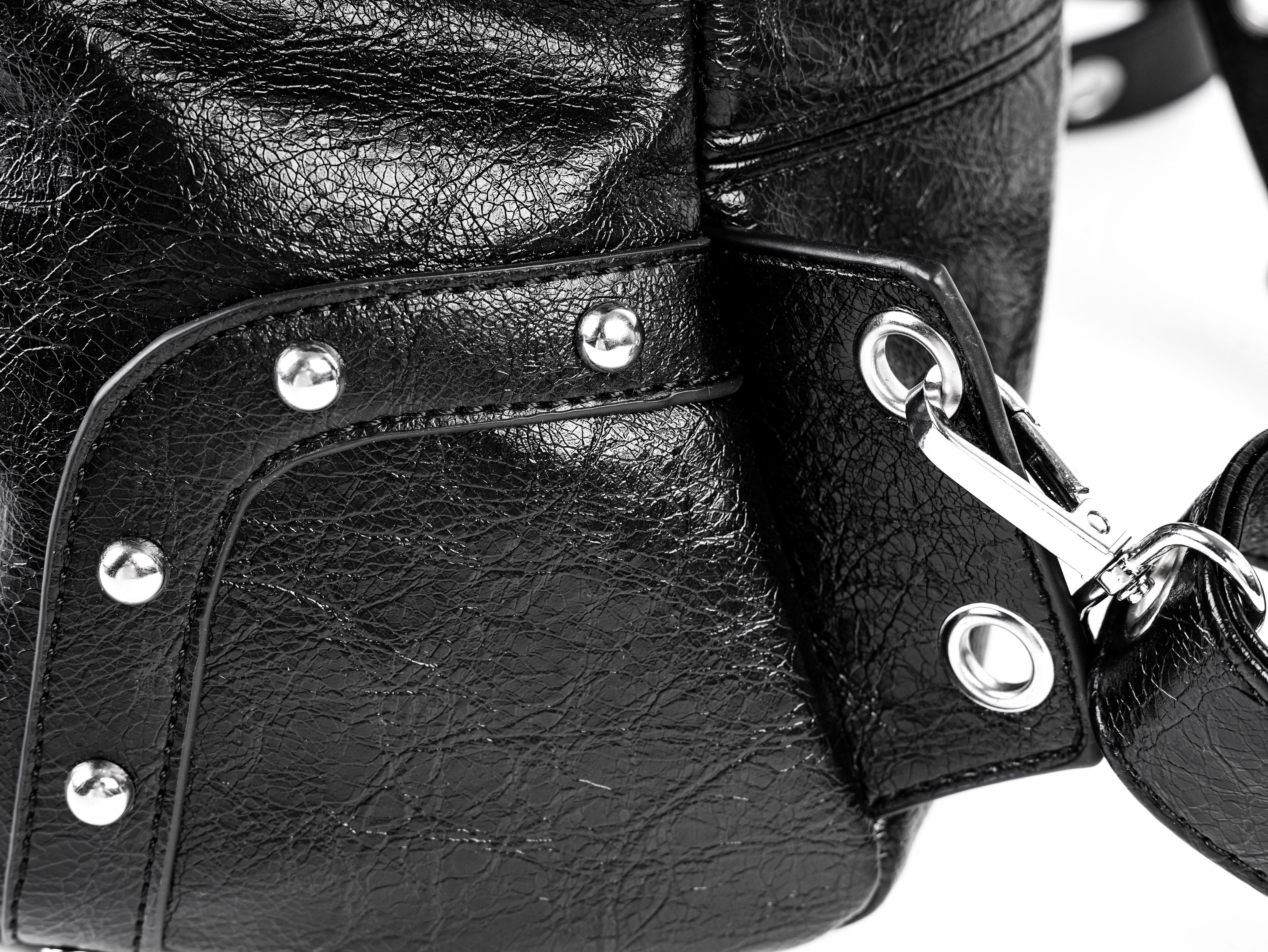 "✝" Cross-cracked leather backpack