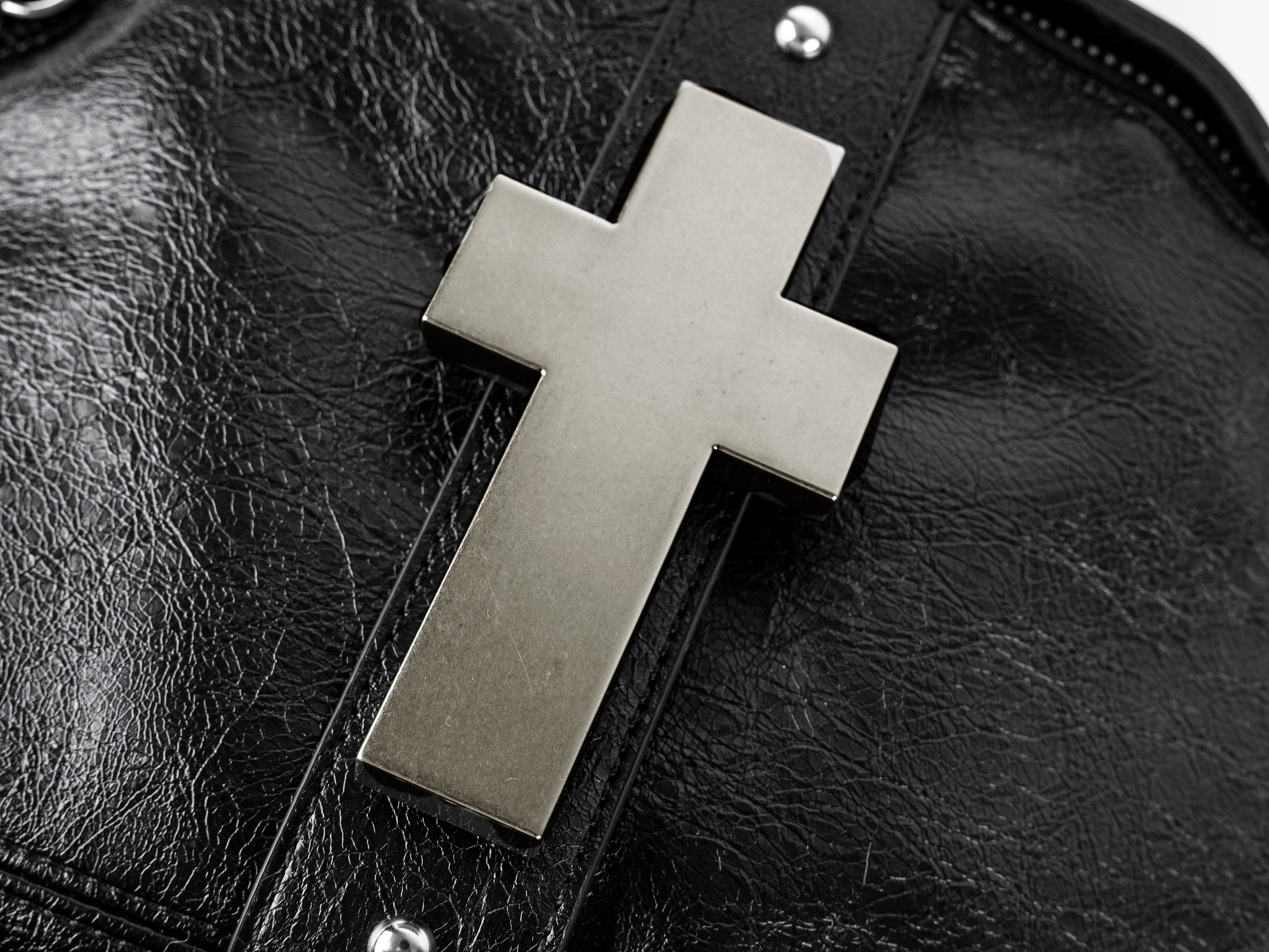 "✝" Cross-cracked leather backpack