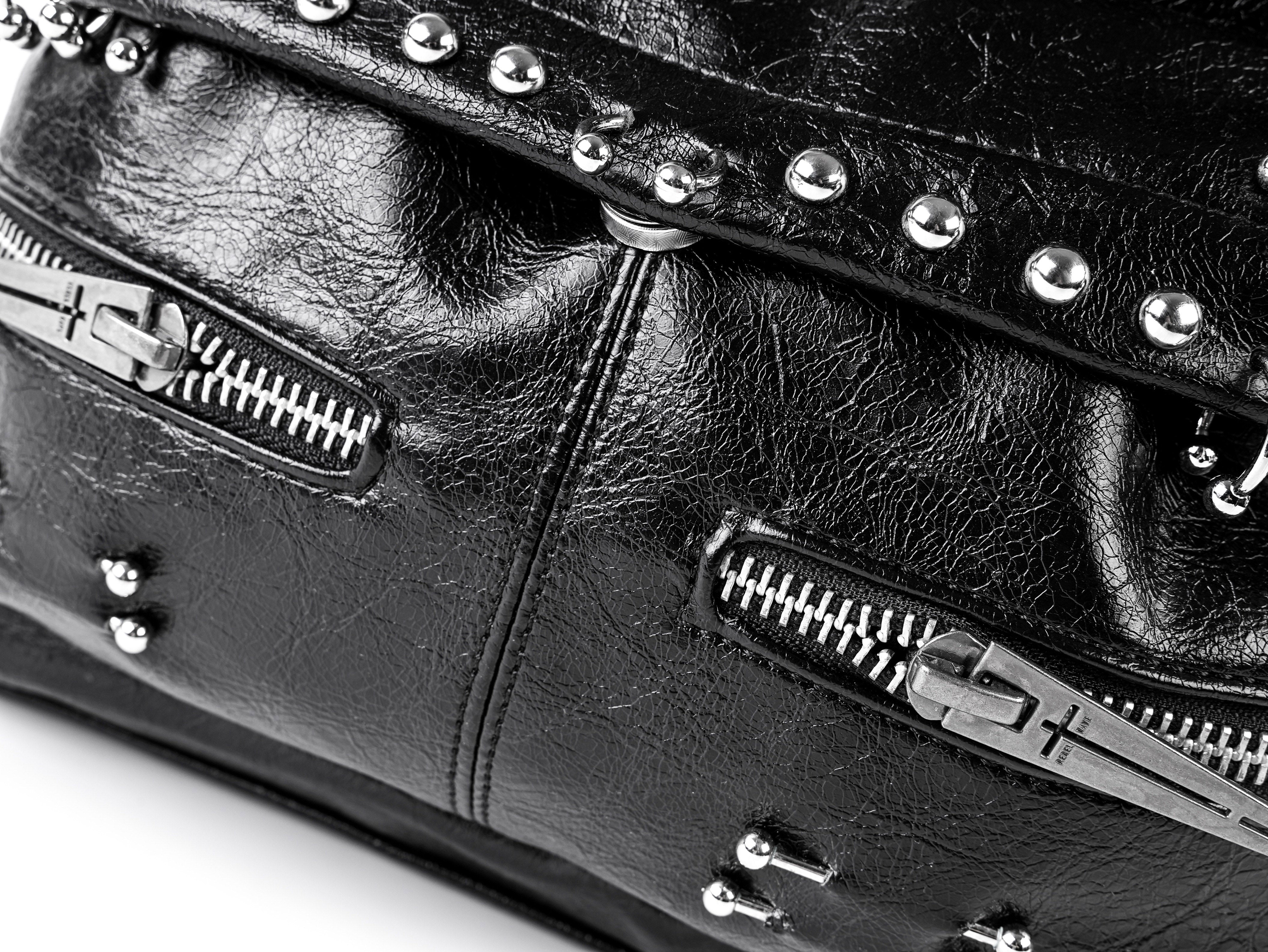 "✝" Cross-cracked leather backpack